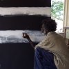 Gary Namponan painting during the Belonging Workshop at Wik & Kugu Art Centre in Aurukun, February 2019. Image: IACA